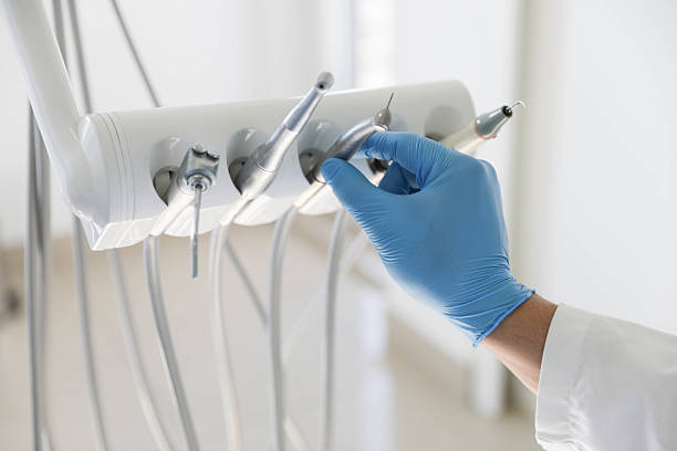 Professional Emergency Dentist technician working in Davis County County, IA